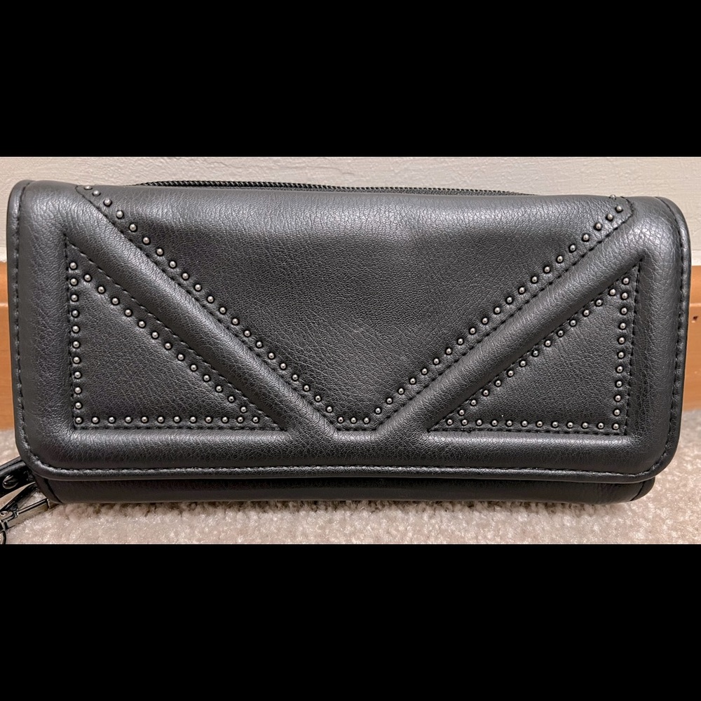 Enzo Angiolini wristlet purse . Black with studs /one side. Multi-compartments.